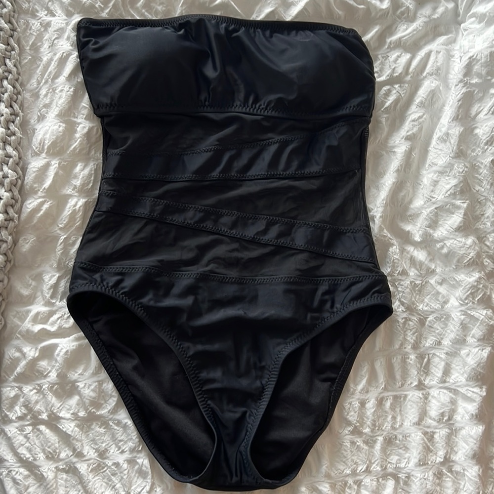 Black one piece off the should swimsuit